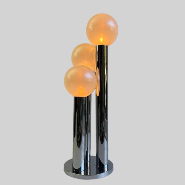 Staff table light by Motoko Ishii with mother-of-pearl shades