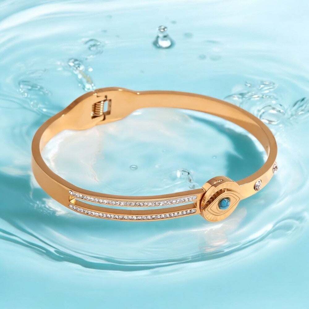 El Ojo 18kt gold plated Bangle