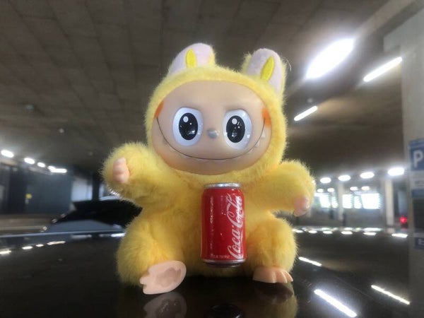 Geel mwt cola blikje