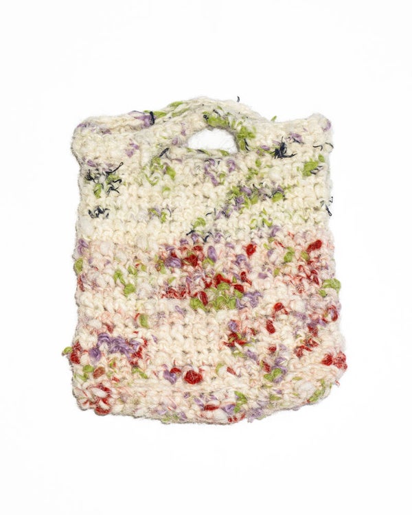 Mini bag in lana filata a mano