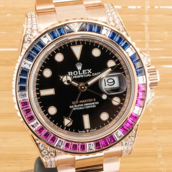 ROLEX GMT MASTER II GOLD 18 KT WITH SAPPHIRE, RUBIES AND DIAMONDS