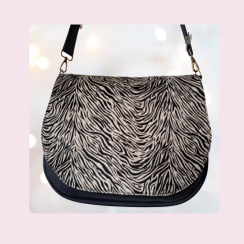 Een maatwerktas in zwart met vacht