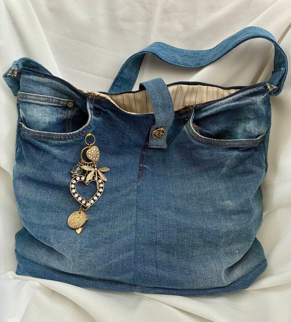 Upcycled, handmade denim handbag with charm