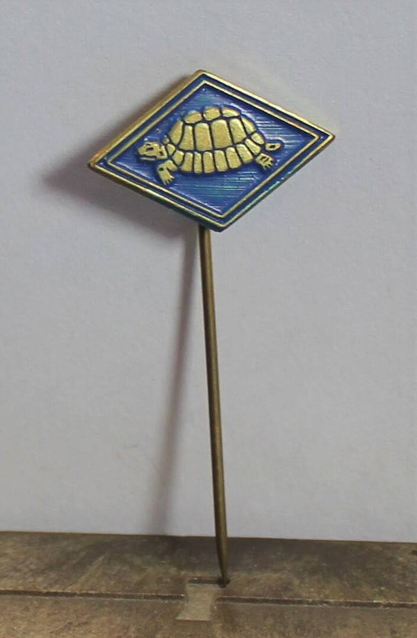 Speldje Schildpad W. v. Veluw (blauw).