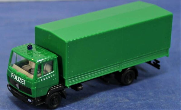Herpa 1/87 H0 828016 MB LK 814 vrachtwagen met huif ‘Polizei’.