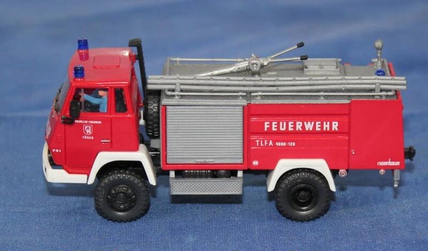 Roco H0 01312 STEYR 91 TLFA 4000-120 blusvoertuig met bemanning.