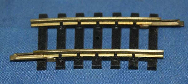 Jouef H0 4874 Gebogen rail (passtuk) R=385, 15°, messing.