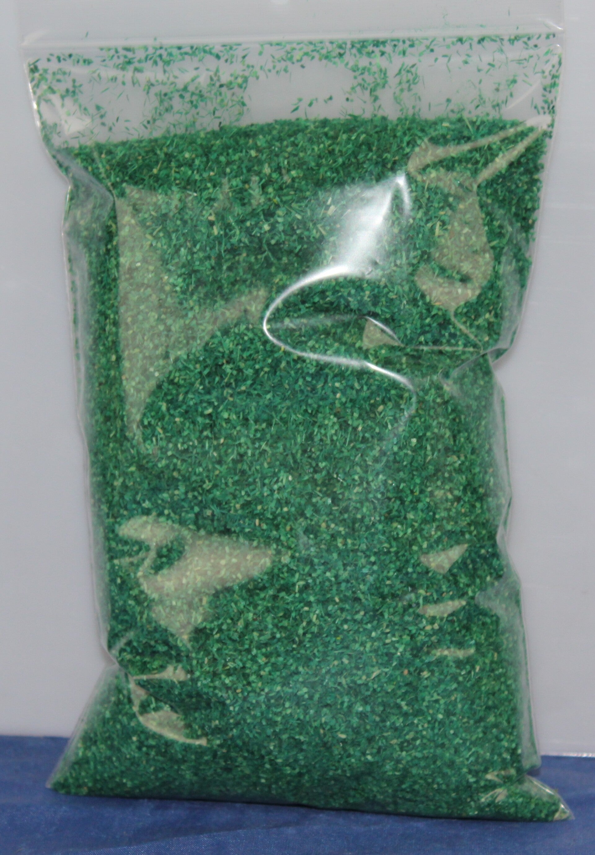 100 gram strooimateriaal groen.