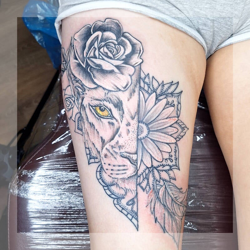 tiger/flower leg tattoo