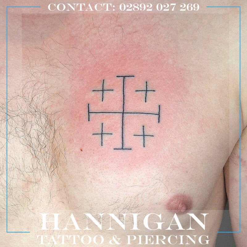 crest chest tattoo