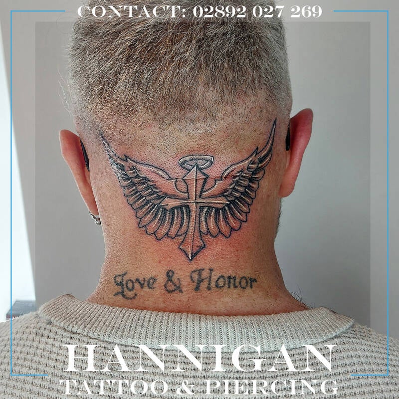 cross and wings neck tattoo