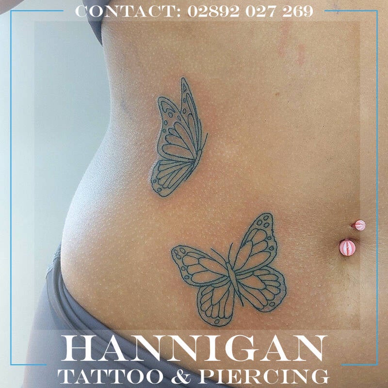 butterfly stomach tattoo