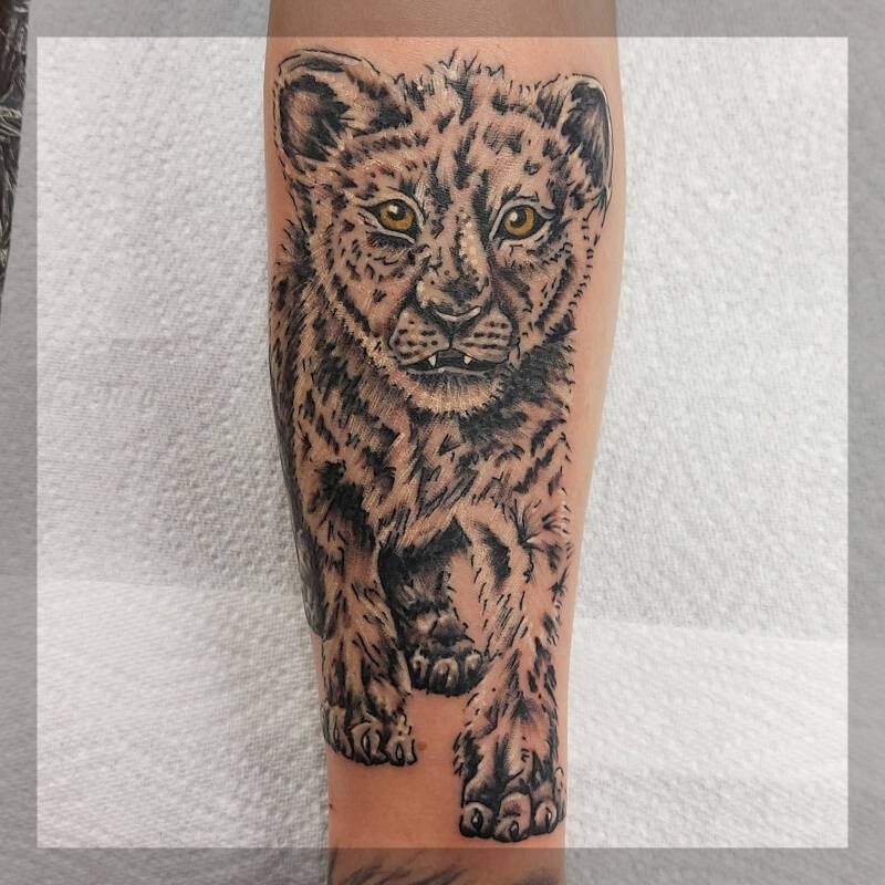 baby white tiger leg tattoo