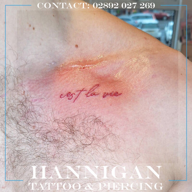 chest text tattoo