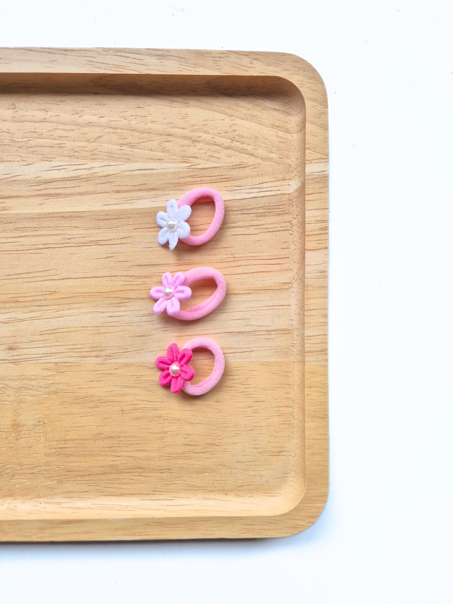 Setje 2 stuks Klippies Elastiekjes bloem roze