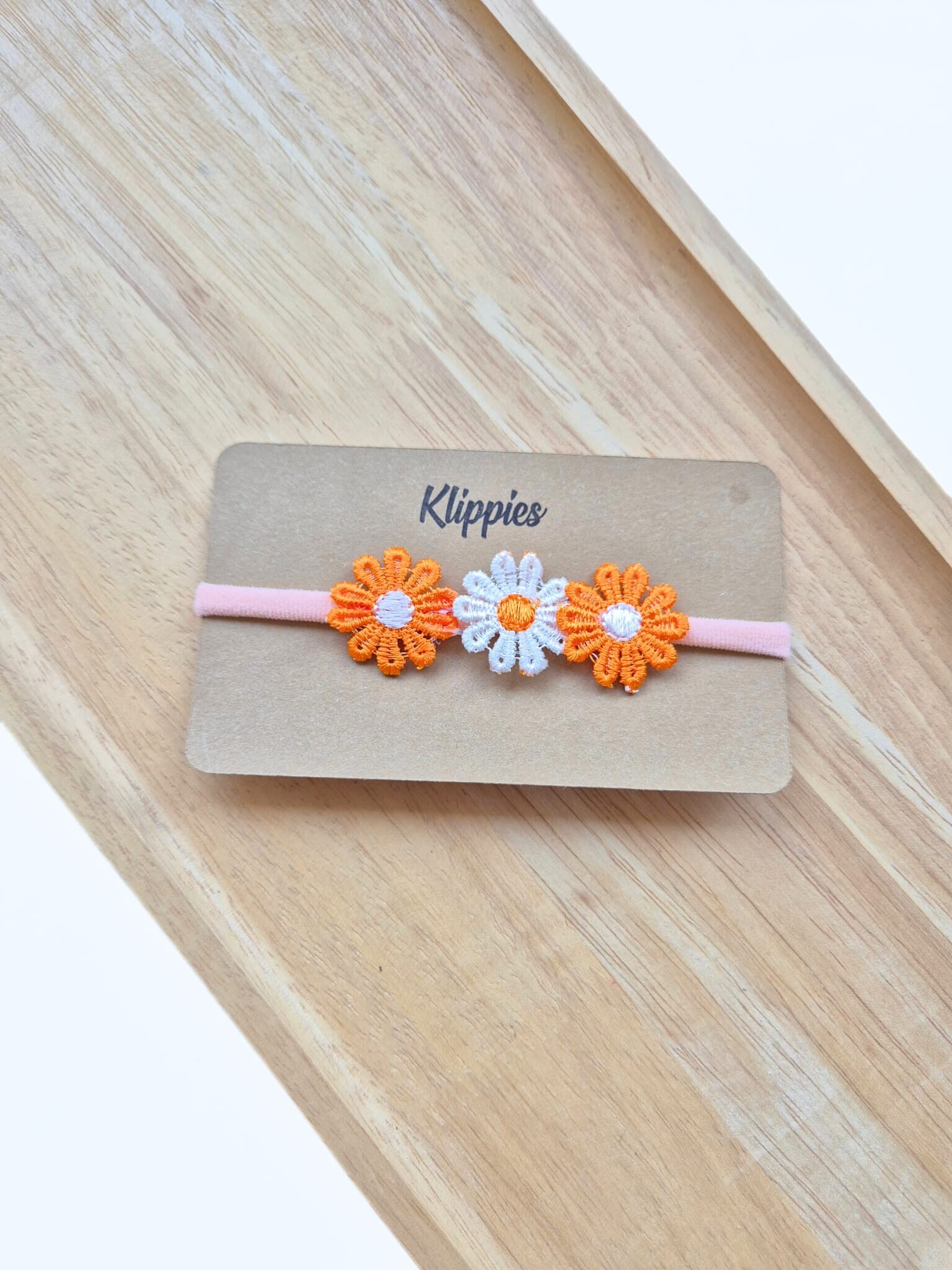 Klippies Babyhaarbandje Midi Bloem Oranje