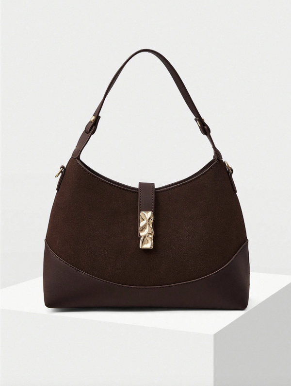 Sac à main en velours avec détail métallique