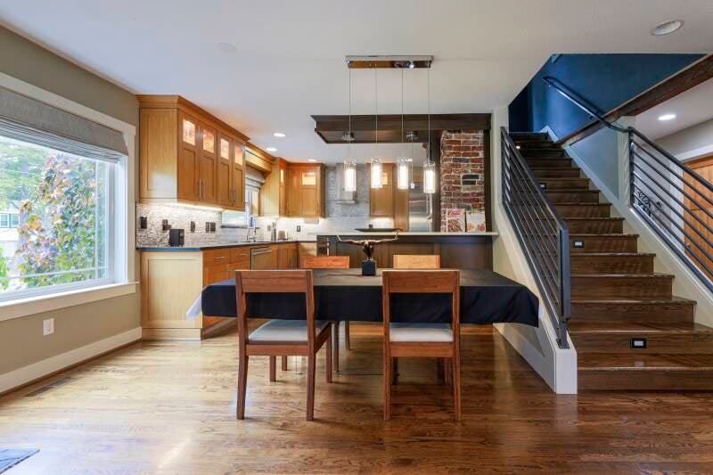 Residential real estate photography of open concept kitchen and dining area in Portland Oregon