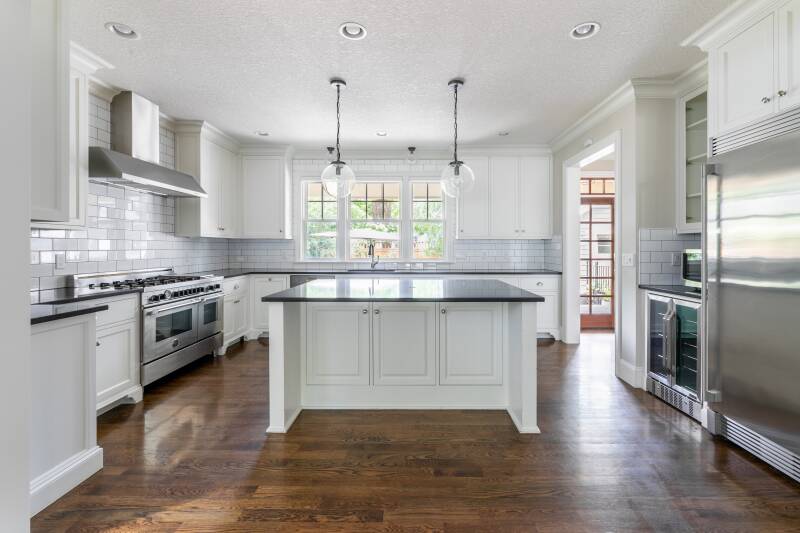 Residential real estate photography of bright white kitchen interior in Vancouver Washington
