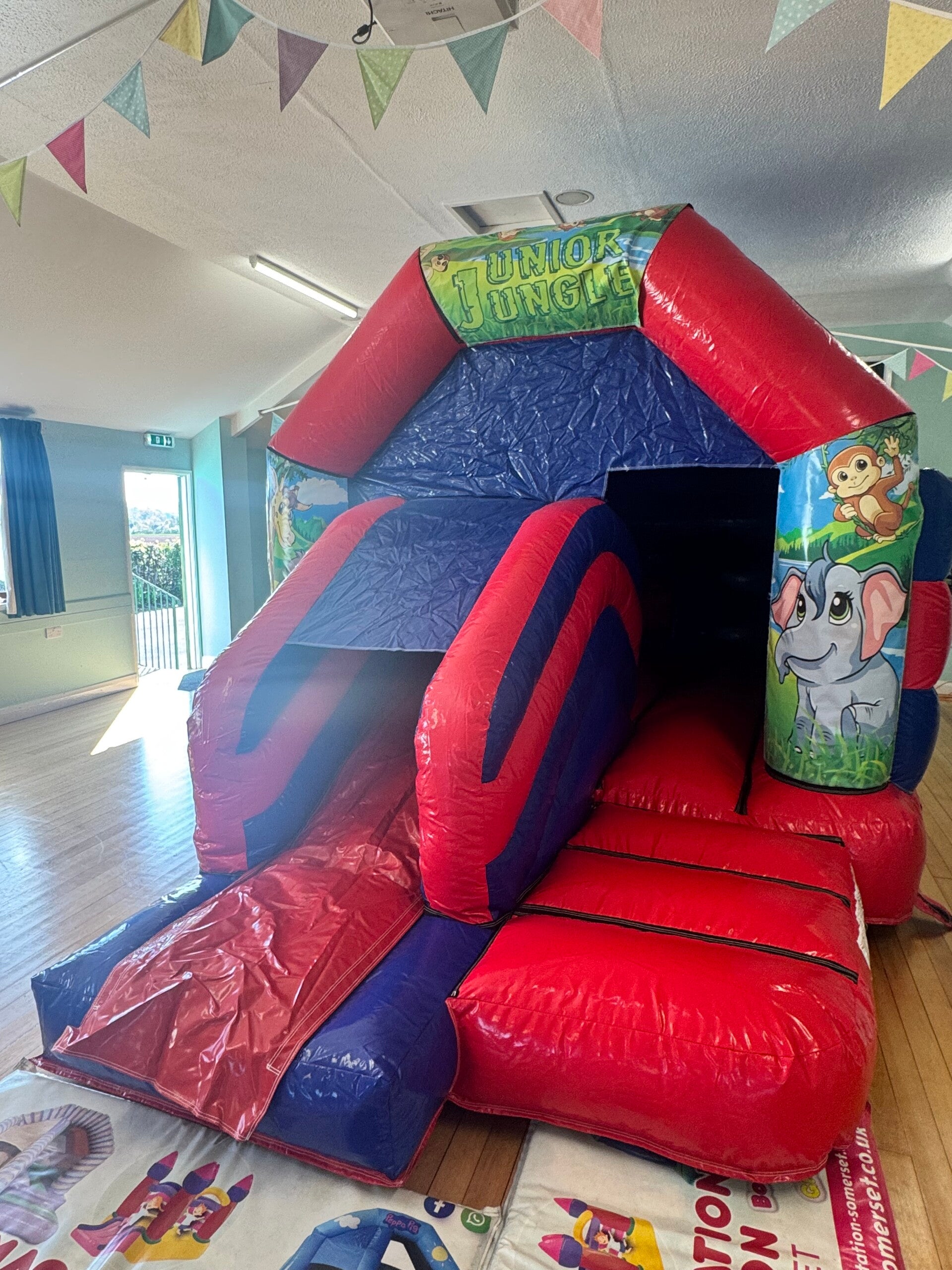 Jungle theme red and blue castle with slide
