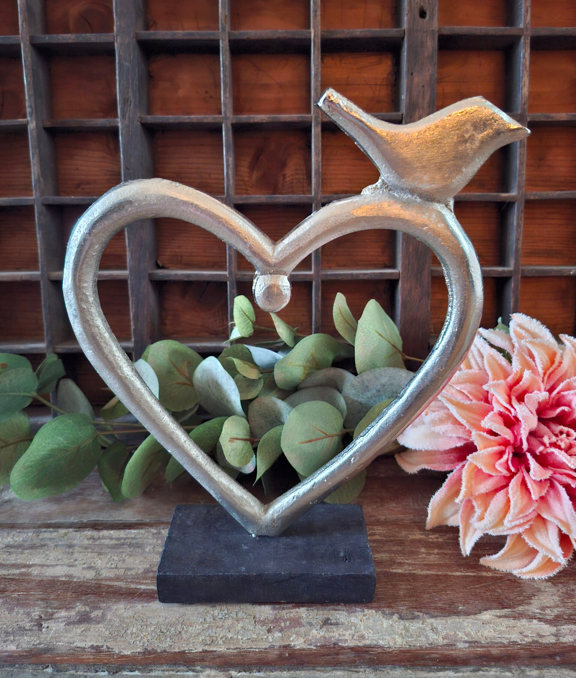 Aluminium hart met vogel