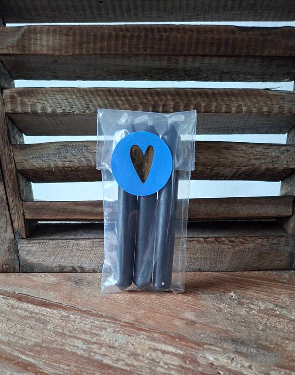 Cadeautje met 3 mini kaarsjes zwart