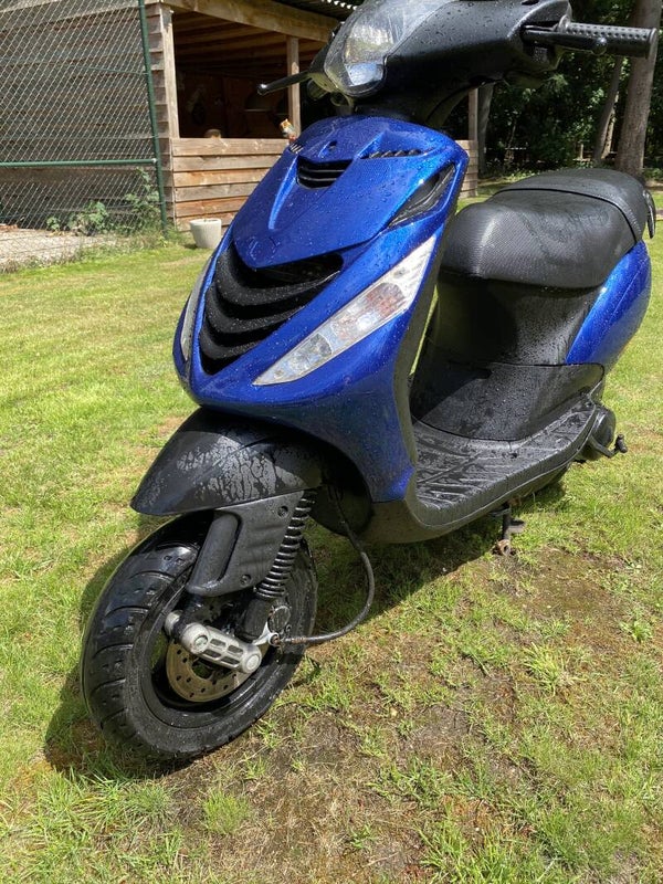 VERKOCHT Piaggio Zip watergekoeld