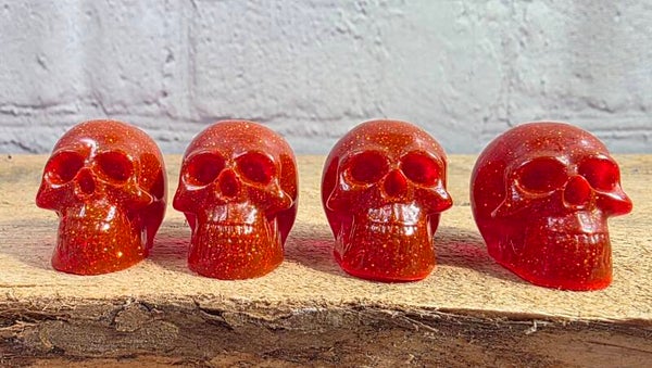 RESIN SKULL HEADS .SET OF 8