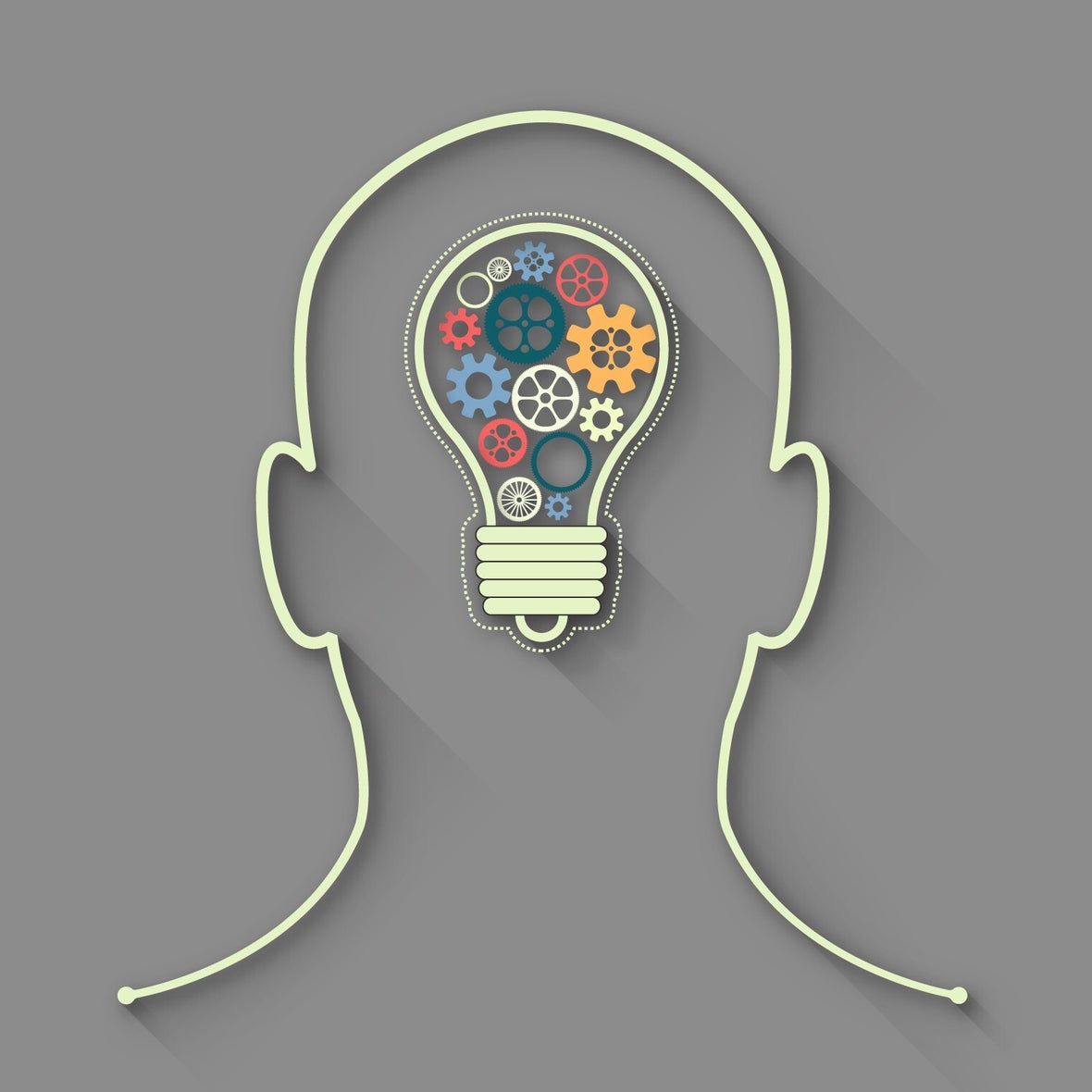 Silhouette eines Kopfes mit einer Glühbirne, gefüllt mit bunten Zahnrädern und Mechanismen in verschiedenen Farben, Kontext Blog Mediumship & Research Institut für Medialität & Afterlife Forschung.