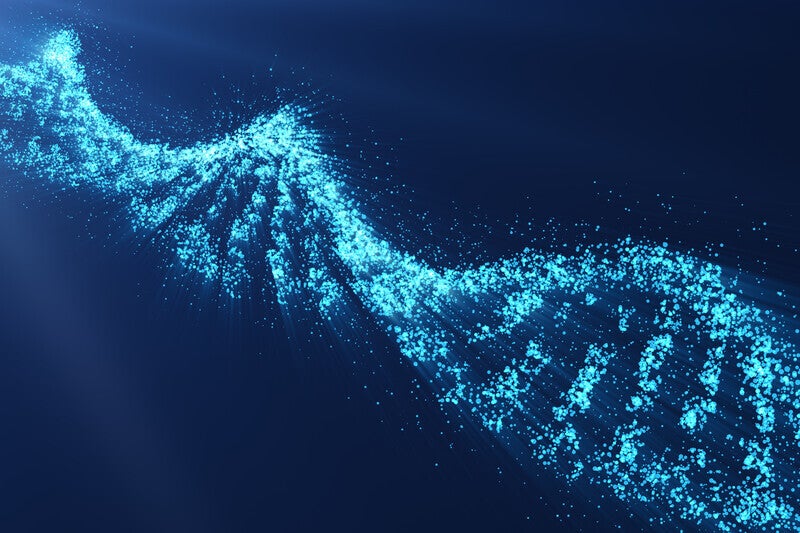 Leuchtende blaue DNA-Doppelhelix aus Partikeln vor dunklem Hintergrund, symbolisch für genetische Informationen, Kontext Blog Mediumship & Research Institut für Medialität & Afterlife Forschung.