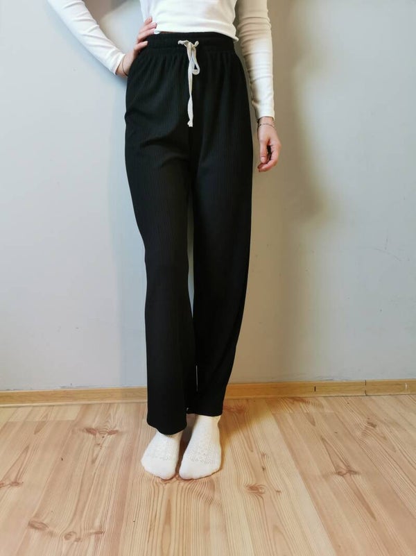 Spodnie materiałowe r. do 38 M kolor czarny wysoki stan