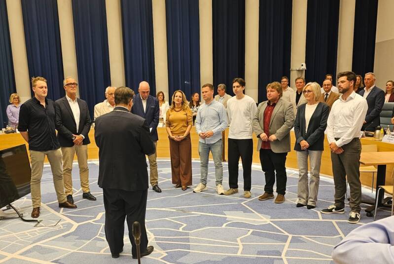 Foto van installatie commissieleden 