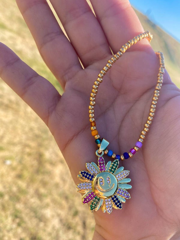 Smiley ketting bloem