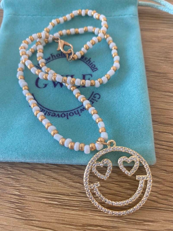 Smiley ketting gold heart eyes