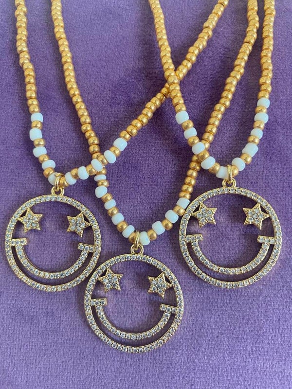 Smiley ketting gold star eyes