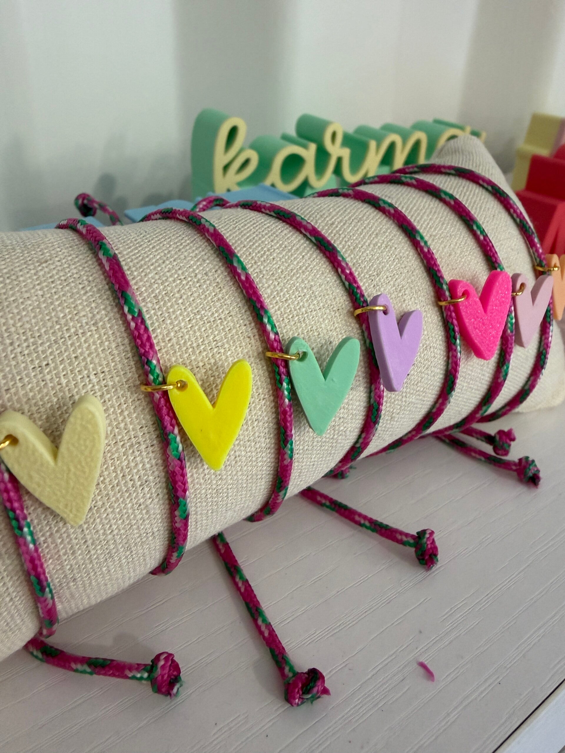 Maritiem armbandje met hartje (roze groen wit)