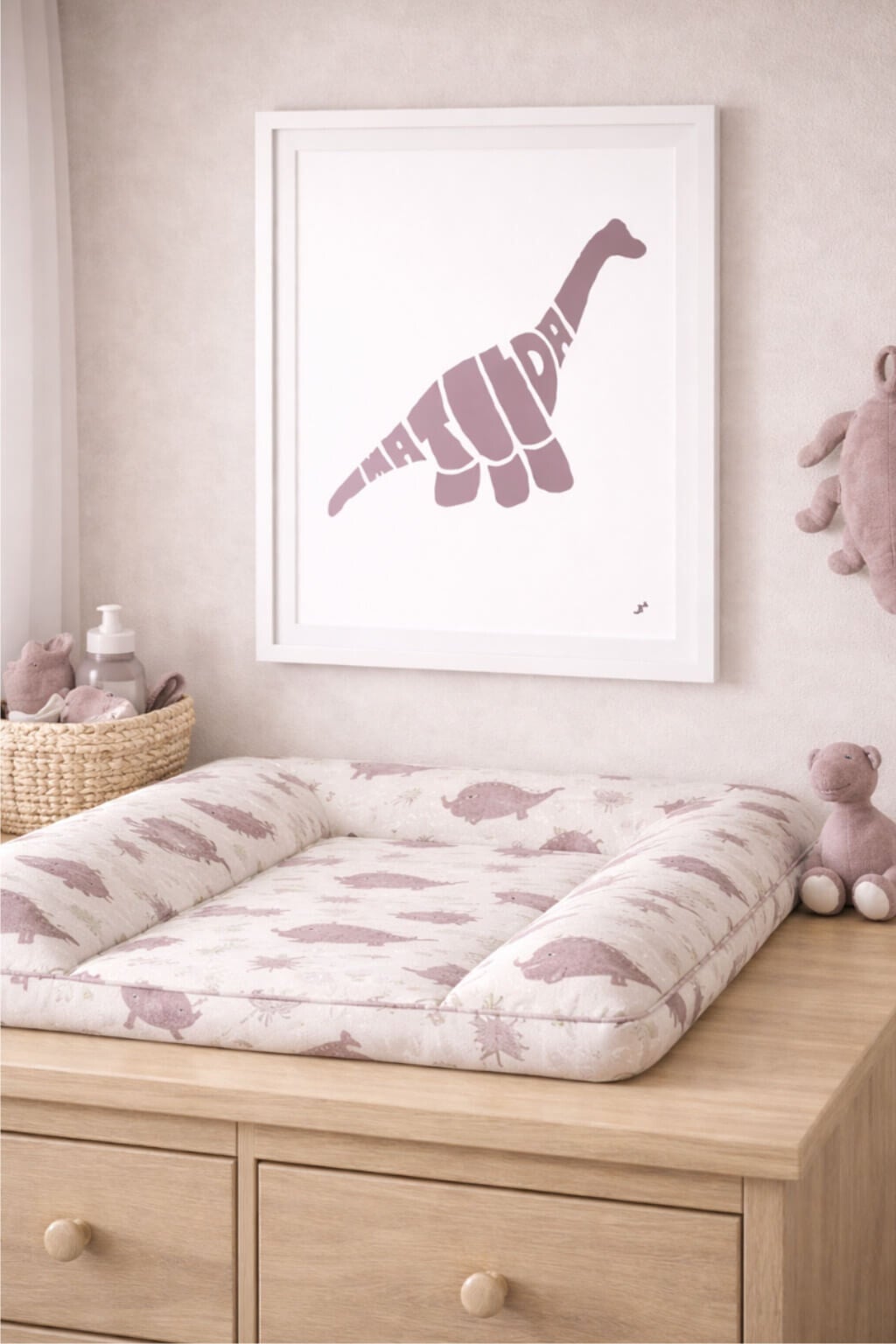 A whimsical illustration of a long-necked Diplodocus with a serene and calm expression. Its body is depicted in soft, sweeping curves, representing peace, harmony, and a dreamy nature. Seen in Misty Mauve.