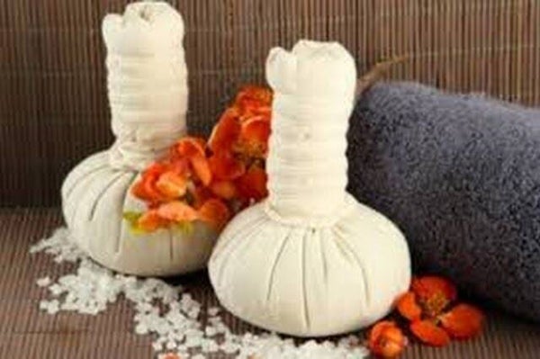 Modelage Holistic aux pochons visage et corps