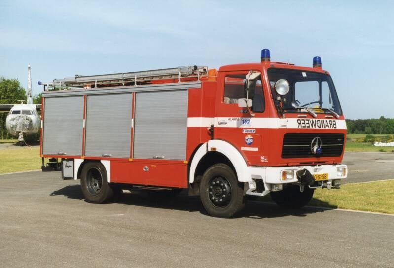 Kenteken: 90-51-SB Roepnummer: Type voertuig: HV-1 / GS-VO Merk &amp; Type: Mercedes Benz 1017AF36 Opbouw: den Hartog Bouwjaar: 1977 In dienst: 1994 Uit dienst: 200. Standplaats: Woensdrecht