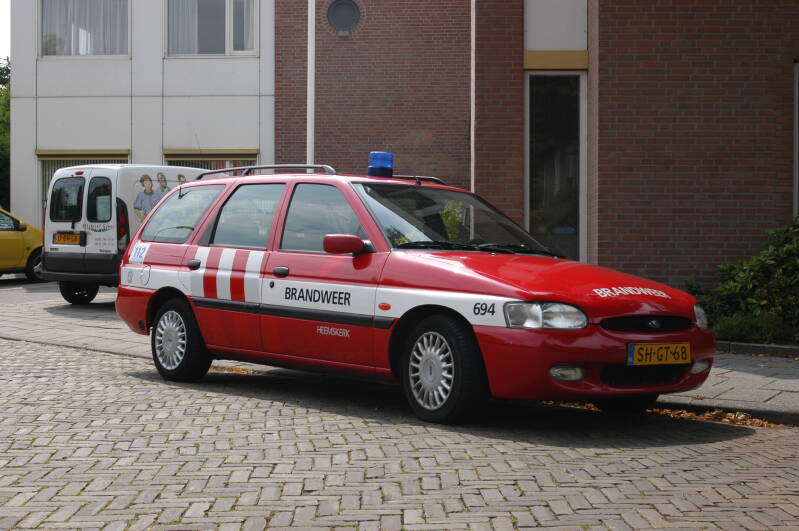 Kenteken: SH-GT-68 Roepnummer: 694 Type voertuig: DA-OD Merk &amp; Type: Ford Escort 1,6i-Wagon Opbouw: Bouwjaar: 1998 In dienst: 1998 Uit dienst: 2007