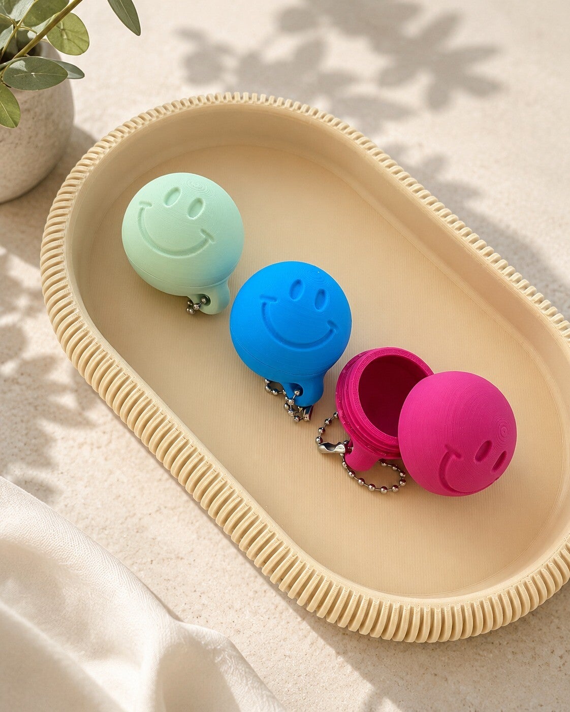 Smiley container sleutelhanger