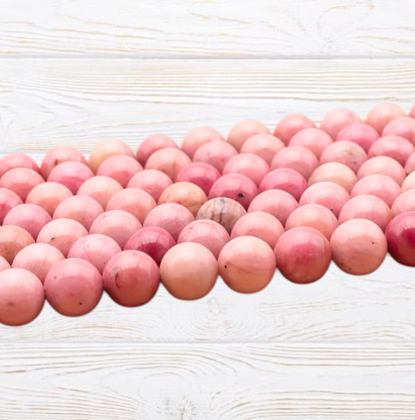 Perles en rhodonite rose A 6mm