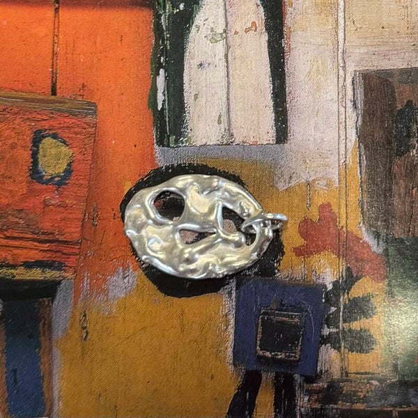 Ovalen medaillon Cobra