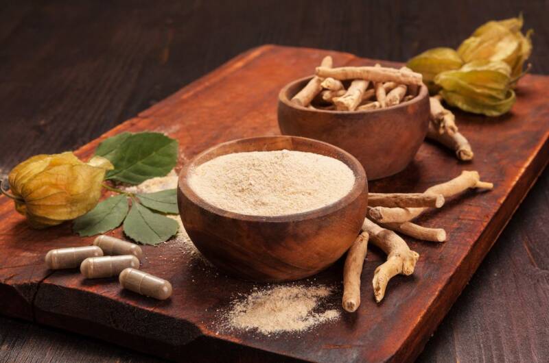 Ashwagandha herbal supplement, pill, ground, and whole root