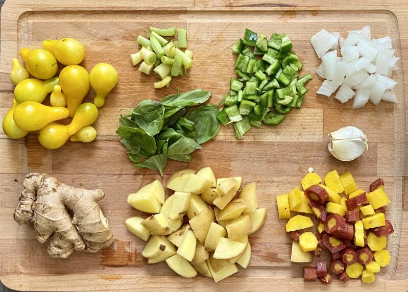 vegetables from my garden for healthy red lentil soup, tomatoes, potatoes, carrots, onions, peppers, garlic, ginger, beans