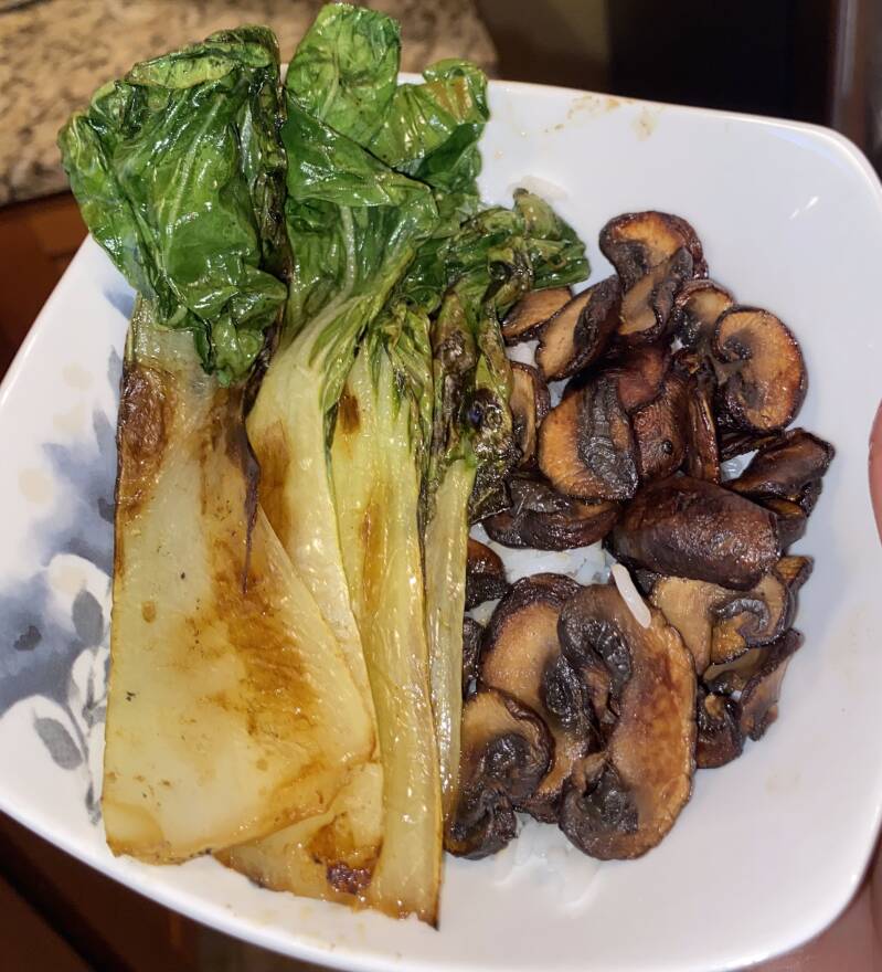 seared oranged and garlic bok choy with mushrooms