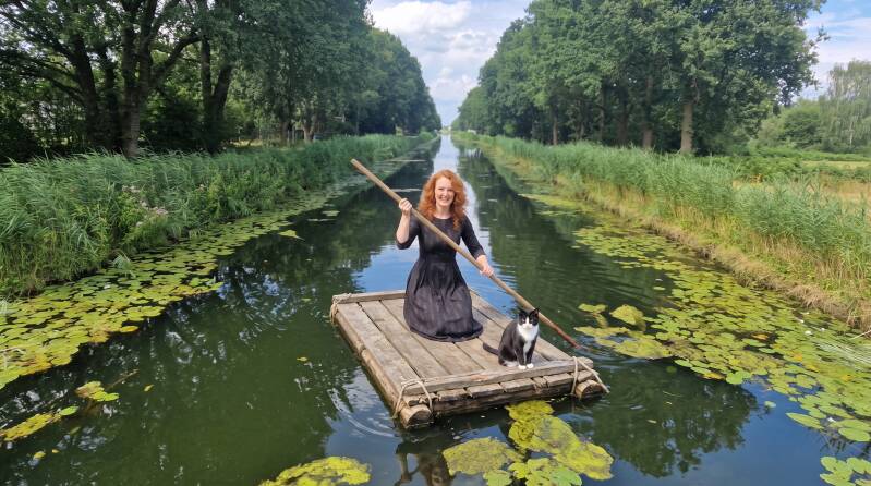 lady_and_cat_on_raft_202608051256-standard.jpg