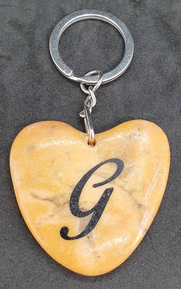 Marmeren hart met letter G