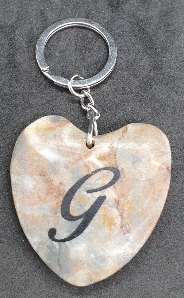 Marmeren hart met letter G
