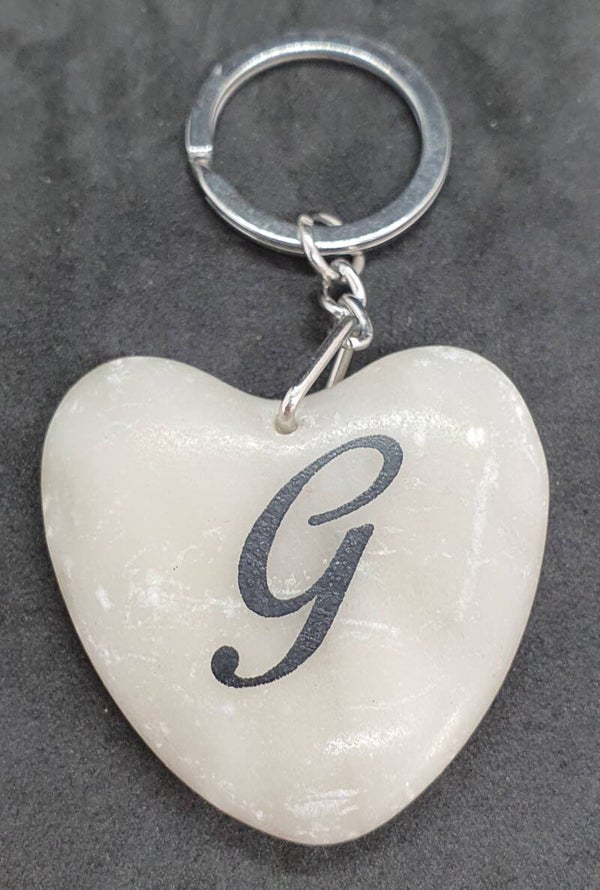 Marmeren hart met letter G